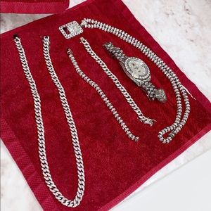 Necklace, watch, pinky ring, and more